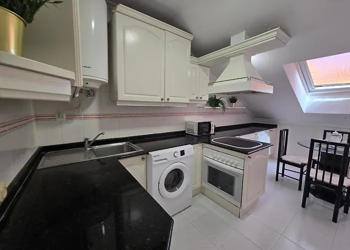 Céntrico ático Rh-10 Apartamento